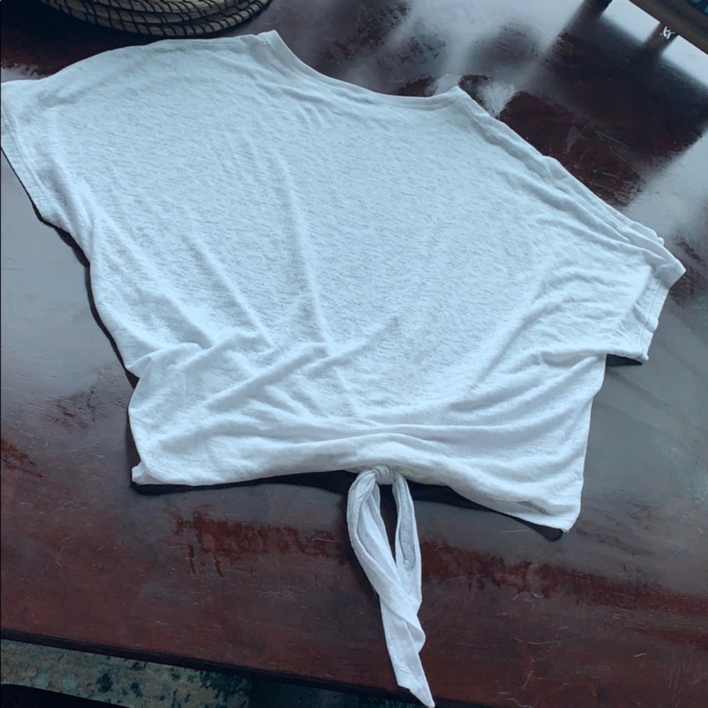 Lululemon white yoga top with tie in back. NWOT